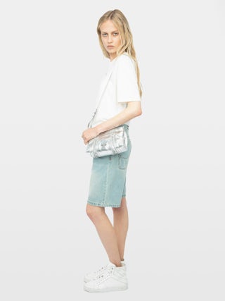 Camiseta Edda - Camiseta asimétrica de manga corta con pedrería en la parte delantera.