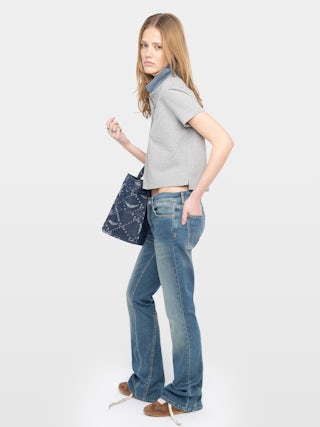 Mirta Polo - Short-sleeved polo with embroidered wings at the front.