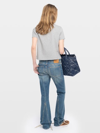 Mirta Polo - Short-sleeved polo with embroidered wings at the front.