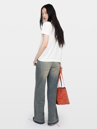 T-shirt Suzan - Pleated short-sleeve t-shirt with wing brooch.