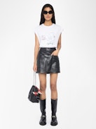Canottiera Cloe - T-shirt senza maniche con strass sul davanti.