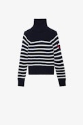 Susan Girls’ Jumper - Girls’ navy blue knit Breton jumper with turtleneck and wings motif.