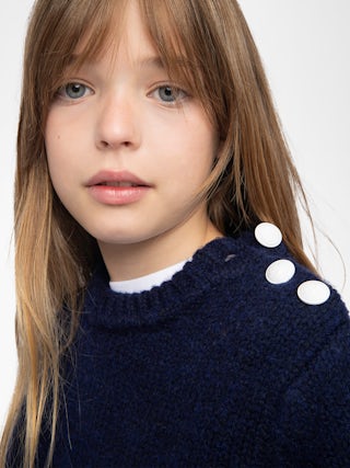 Malta Girl's Jumper - Wool jumper, round neck and buttoned opening on the shoulder, fancy logo embroidered on the sleeve.