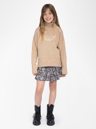Alma Girls' Jumper - Wool jumper with high neck, shoulder button fastening, wing embroidery at front.