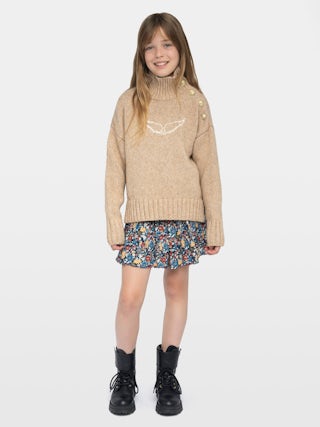 Alma Girls' Jumper - Wool jumper with high neck, shoulder button fastening, wing embroidery at front.