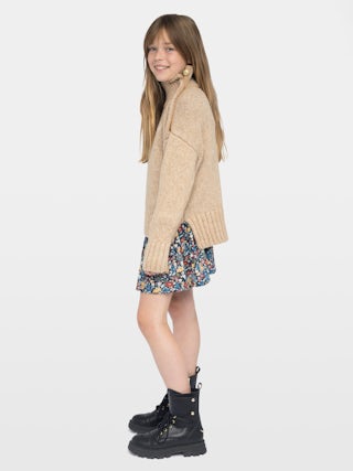 Alma Girls' Jumper - Wool jumper with high neck, shoulder button fastening, wing embroidery at front.
