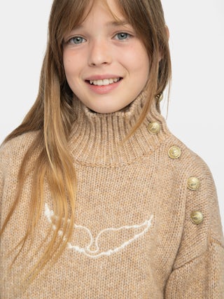 Alma Girls' Jumper - Wool jumper with high neck, shoulder button fastening, wing embroidery at front.