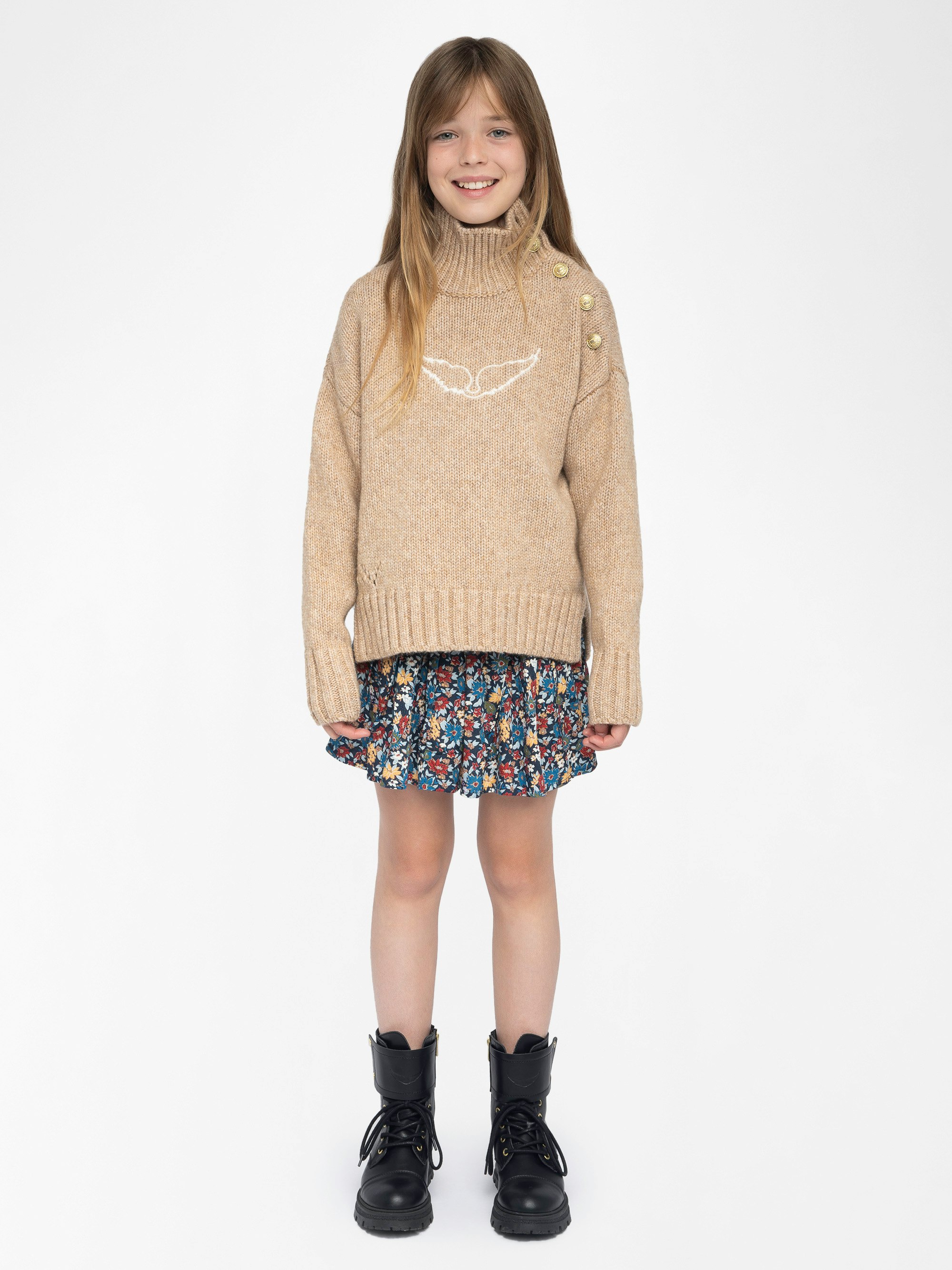 Alma Girls' Jumper - Wool jumper with high neck, shoulder button fastening, wing embroidery at front.