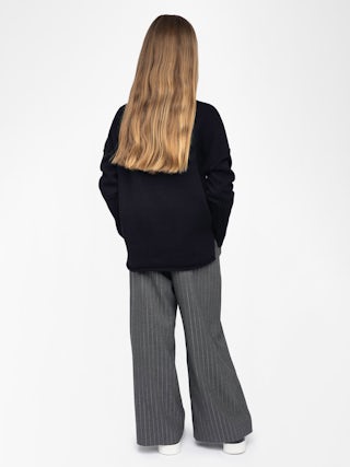 Almi Girl's Jumper - Wool jumper with high neck, loose fit, "Rock'n'Roll" embroidery on front, dropped shoulders.