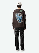 Oliver Cardigan - Long-sleeved brown knitted zip-up cardigan with hood, Dinosaur intarsia motif on back and "Art Is Truth" message on right sleeve.
