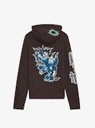 Oliver Cardigan - Long-sleeved brown knitted zip-up cardigan with hood, Dinosaur intarsia motif on back and "Art Is Truth" message on right sleeve.