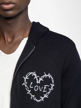 Cardigan Clash - Hooded cardigan with zip fastening and heart embroidery on the front.