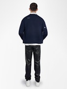 Mirko Cardigan - V-neck buttoned cardigan with distressed effect.
