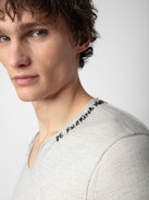 Monastir Jumper 100% Merino Wool - Light grey 100% merino wool jumper with Henley neckline featuring “Be Fucking Nice” embroidery.