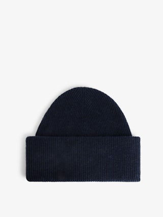 Ben Hat 100% Cashmere - 100% navy blue cashmere hat adorned with a signature.