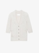 Cardigan Betsy - Cardigan in maglia écru con maniche 3/4, spalle arricciate e chiusura con bottoni gioiello a stella.