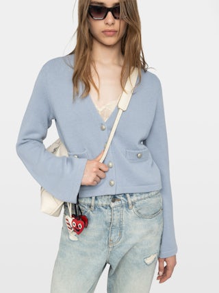 Nolly Cardigan - Button-up V-neck cardigan with patch pockets on the front.