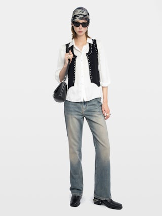 Cardigan Dublin - Petite veste sans manches cloutée.