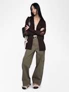 Cardigan Cosya - Hooded cardigan with western patch at elbows.
