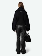 Attila Jacket - Short black zip-up wool and cashmere knit jacket with roll neck and metal wings on the back.