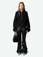 Attila Jacket - Short black zip-up wool and cashmere knit jacket with roll neck and metal wings on the back.