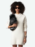Alky Dress 100% Merino Wool - Ecru ribbed 100% merino wool mini dress with openwork cable stitching and buttons on the shoulders.