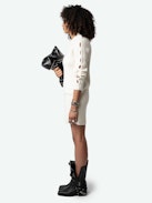 Alky Dress 100% Merino Wool - Ecru ribbed 100% merino wool mini dress with openwork cable stitching and buttons on the shoulders.