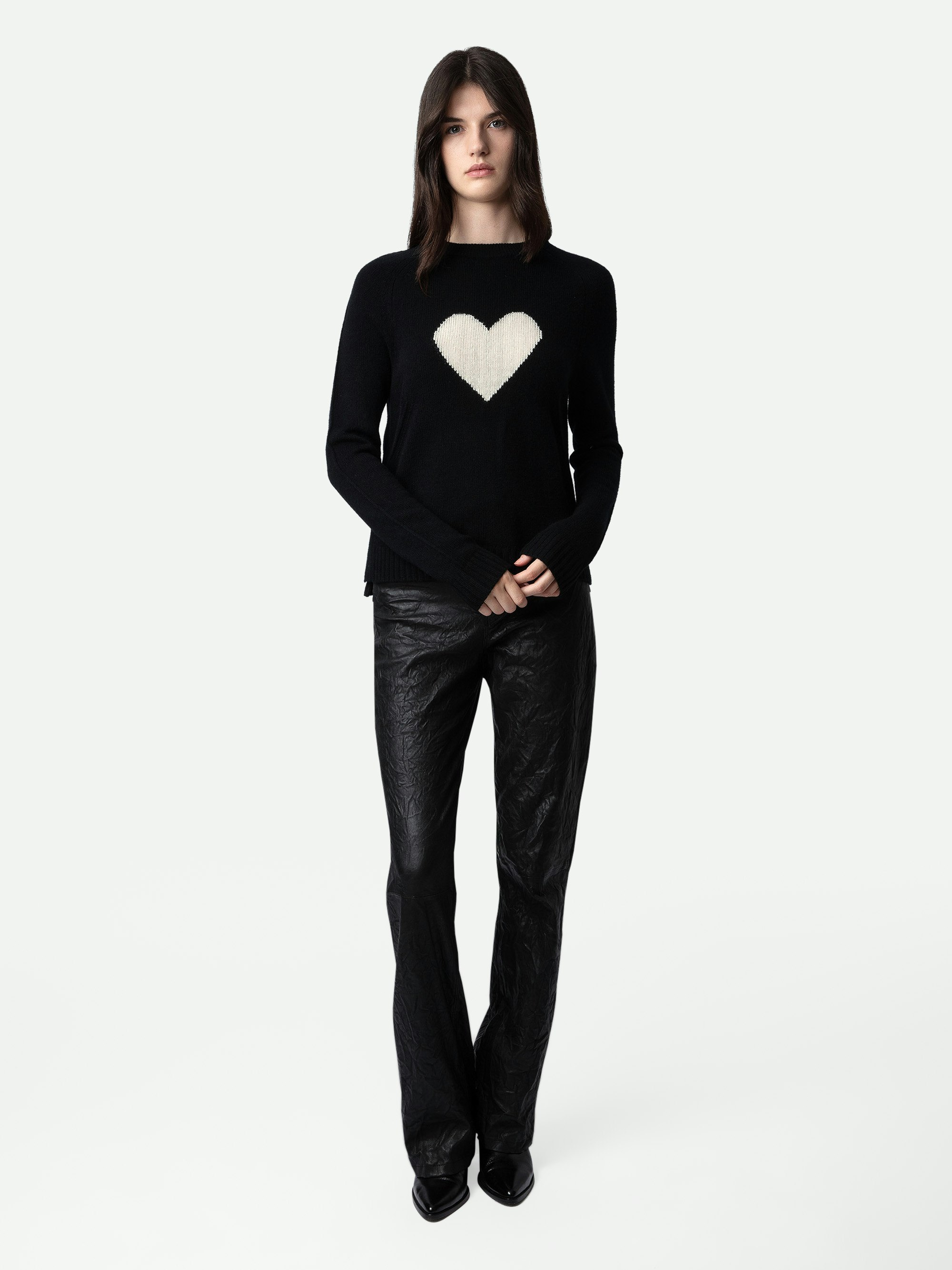 Lili Cashmere Sweater - Women’s black cashmere sweater with heart embellishment on the front.