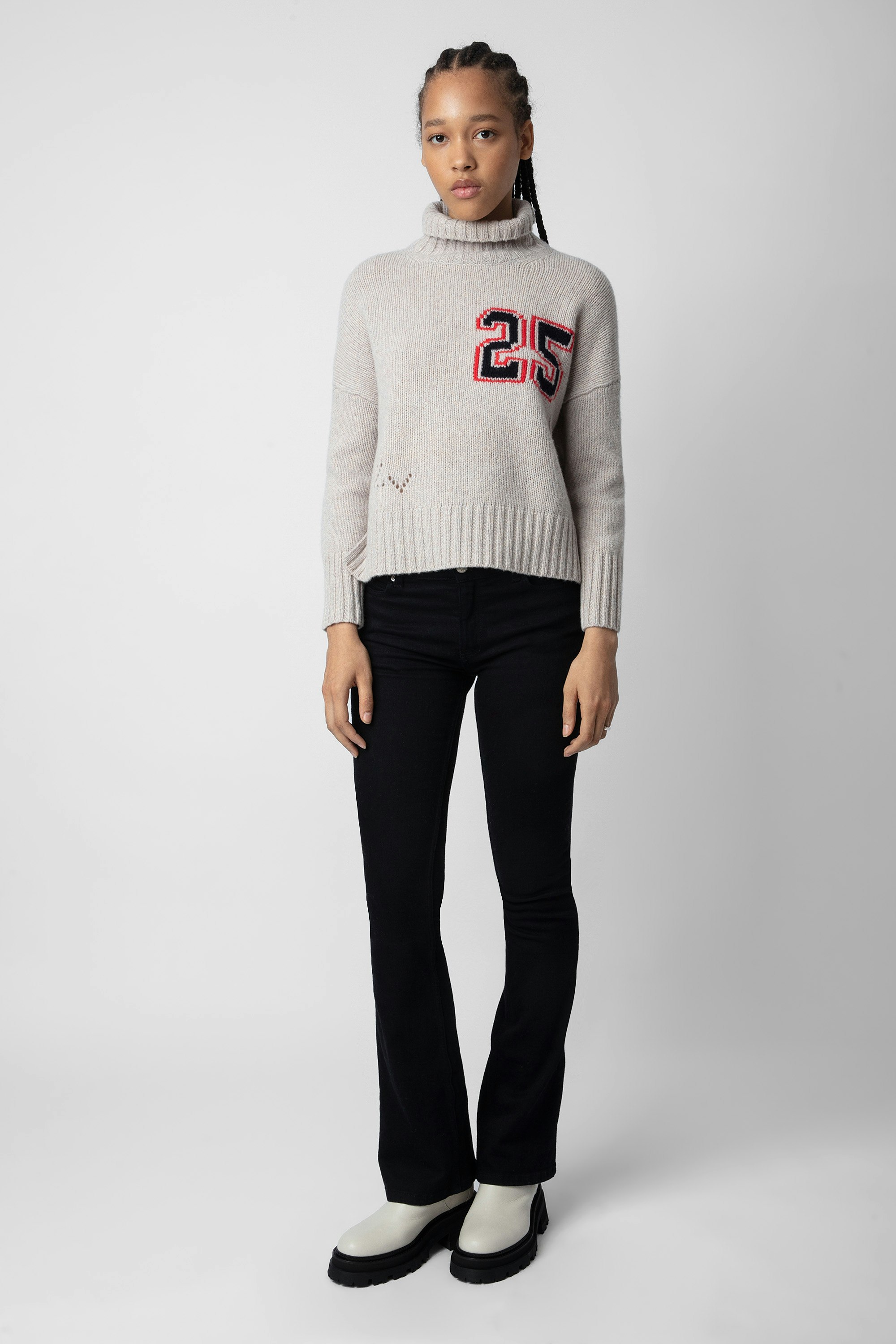Blee 25 Sweater - Women’s beige merino wool sweater with mock neckline and intarsia jacquard “25” slogan.