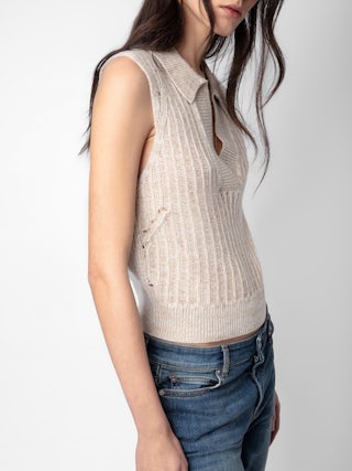 Pull Lunny 100% Laine Merinos - Pull sans manches court et ajouré en 100% laine mérinos écrue à col V ouvert.