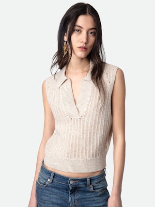 Pull Lunny 100% Laine Merinos - Pull sans manches court et ajouré en 100% laine mérinos écrue à col V ouvert.