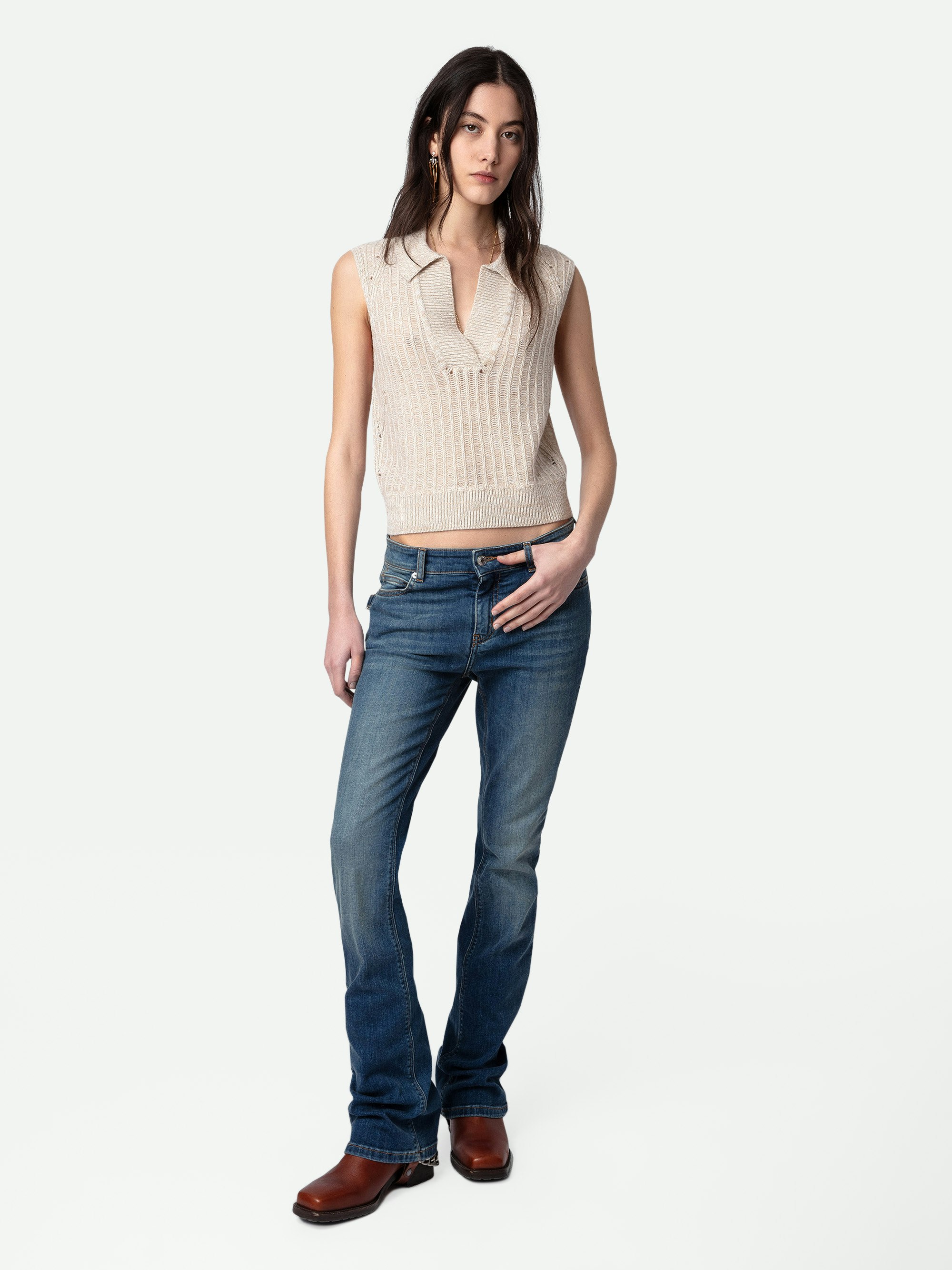 Lunny Sweater - Ecru merino wool cropped sleeveless sweater with openwork details and open V neckline.