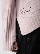 Malta Mon Amour Sweater - Wrap yourself in comfort with the women’s “Mon Amour” sweater, crafted from soft primrose pink merino wool. Featuring an intarsia jacquard “Mon Amour” slogan and delicate pointelle ZV signature, this sweater adds a touch of elegance to your wardrobe. Its thumbholes, ribbed trim, and classic round neckline offer both style and practicality. A cozy yet chic essential, this mon amour sweater is perfect for any occasion.