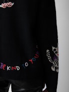 Markus Cashmere Sweater - Women's black cashmere motif sweater with customized details designed by Humberto Cruz.