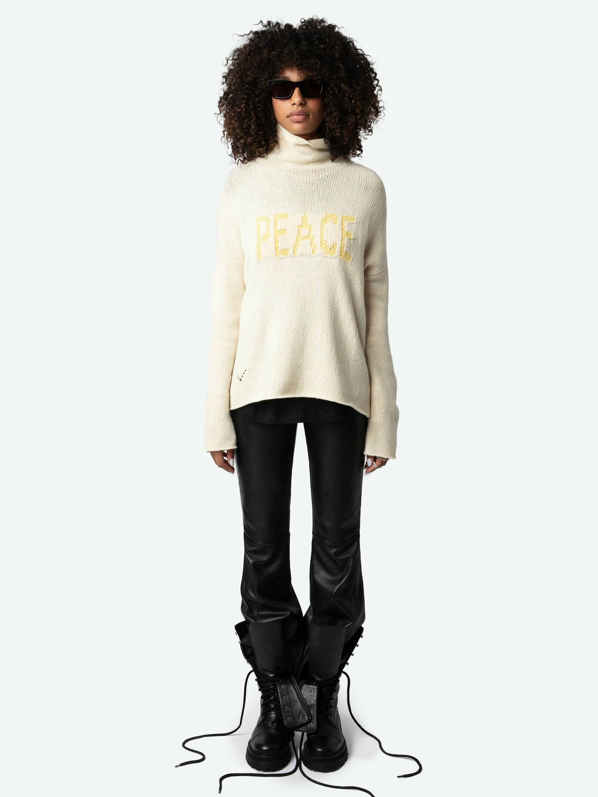 Almy Jumper 100% Merino Wool - Long, loose-fitting, light yellow 100% merino wool jumper with funnel neck and "Peace" message in contrasting tweed.