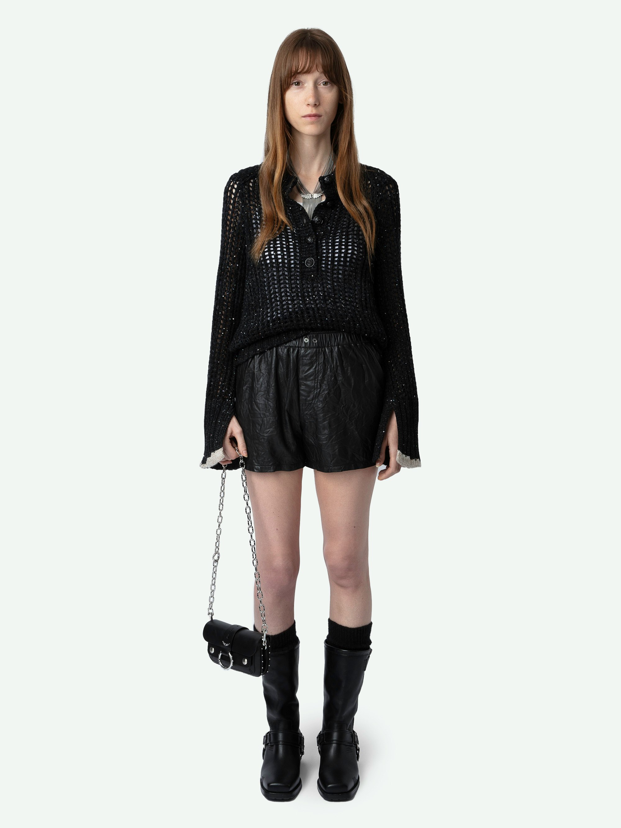 Pull Halty - Pull en maille résille tricotée en laine noire à paillettes, manches longues et poignets fendus contrastés.