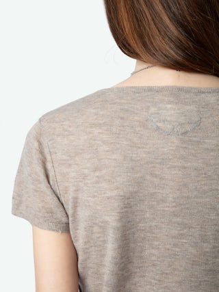 Jumper Celsy 100% Cashmere - Tunisian jumper with short sleeves, wing embroidery on the back and worn-effect edges.