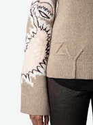 Maglione Sal 100% Lana Merino - Maglione in 100% lana merino marrone con collo alto, maniche lunghe svasate, con motivi e ricami vegetali sulle maniche.