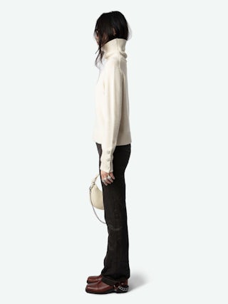 Pull Boxy 100% Cachemire - Pull en 100% cachemire écrue à col montant, manches longues et poignets boutonnés à bijoux étoiles ornées de strass.