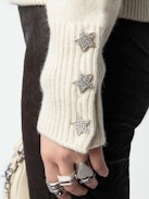 Boxy Jewelled Sweater - Long-sleeved ecru knit button sleeve sweater with funnel neck, button cuffs, and diamanté star jewels.