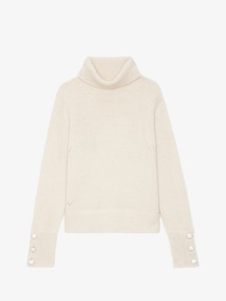 Pull Boxy 100% Cachemire - Pull en 100% cachemire écrue à col montant, manches longues et poignets boutonnés à bijoux étoiles ornées de strass.