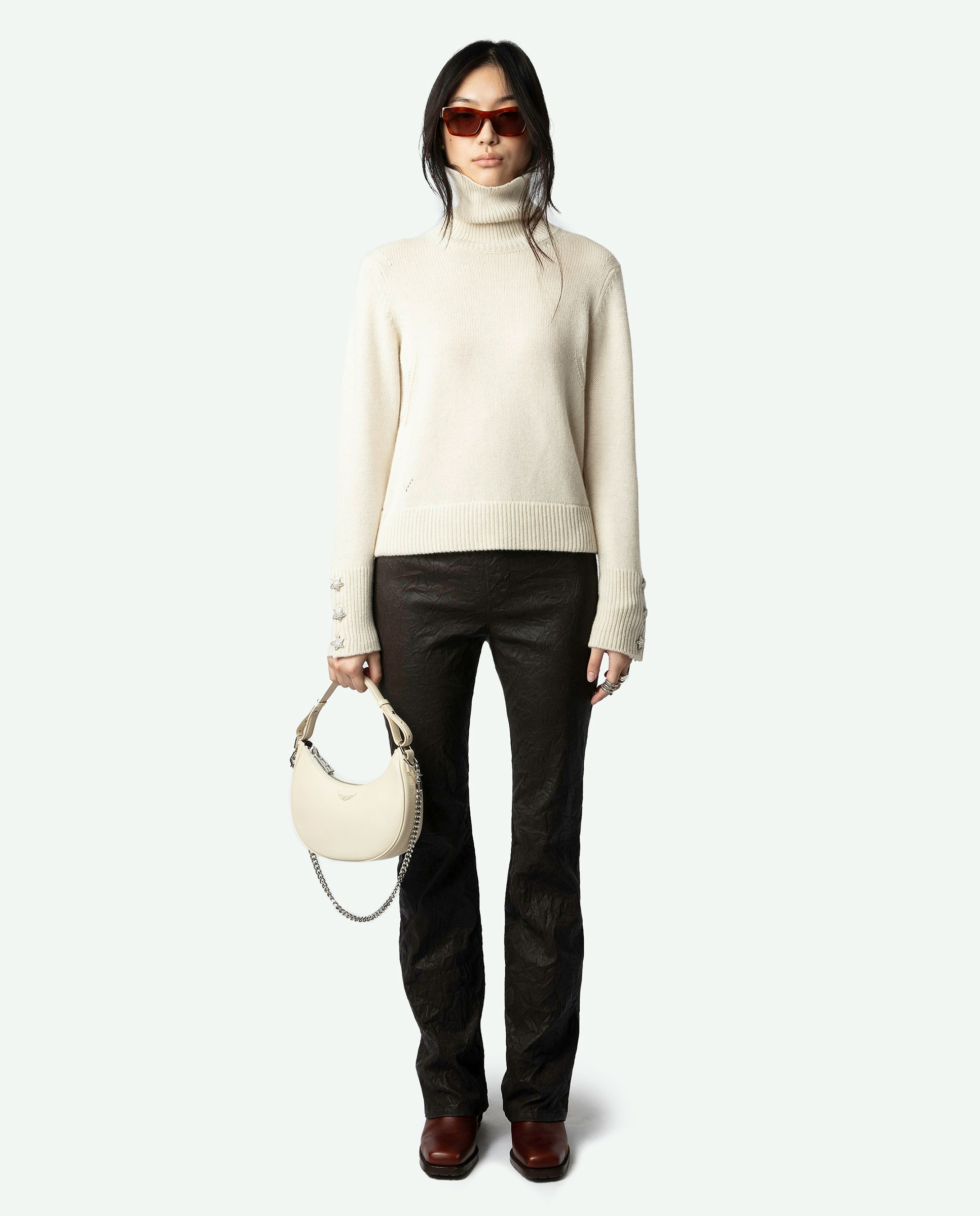 Boxy Jewelled Sweater - Long-sleeved ecru knit sweater with funnel neck and buttoned cuffs with diamanté star jewels.