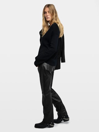 Miky Cashmere Sweater - Black cashmere sweater adorned with "Rock'n'Roll" embroidery on the collar and "Call Me Baby" on the right sleeve.