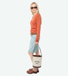 Sayan Sweater - Long-sleeved knit top with wing closure.