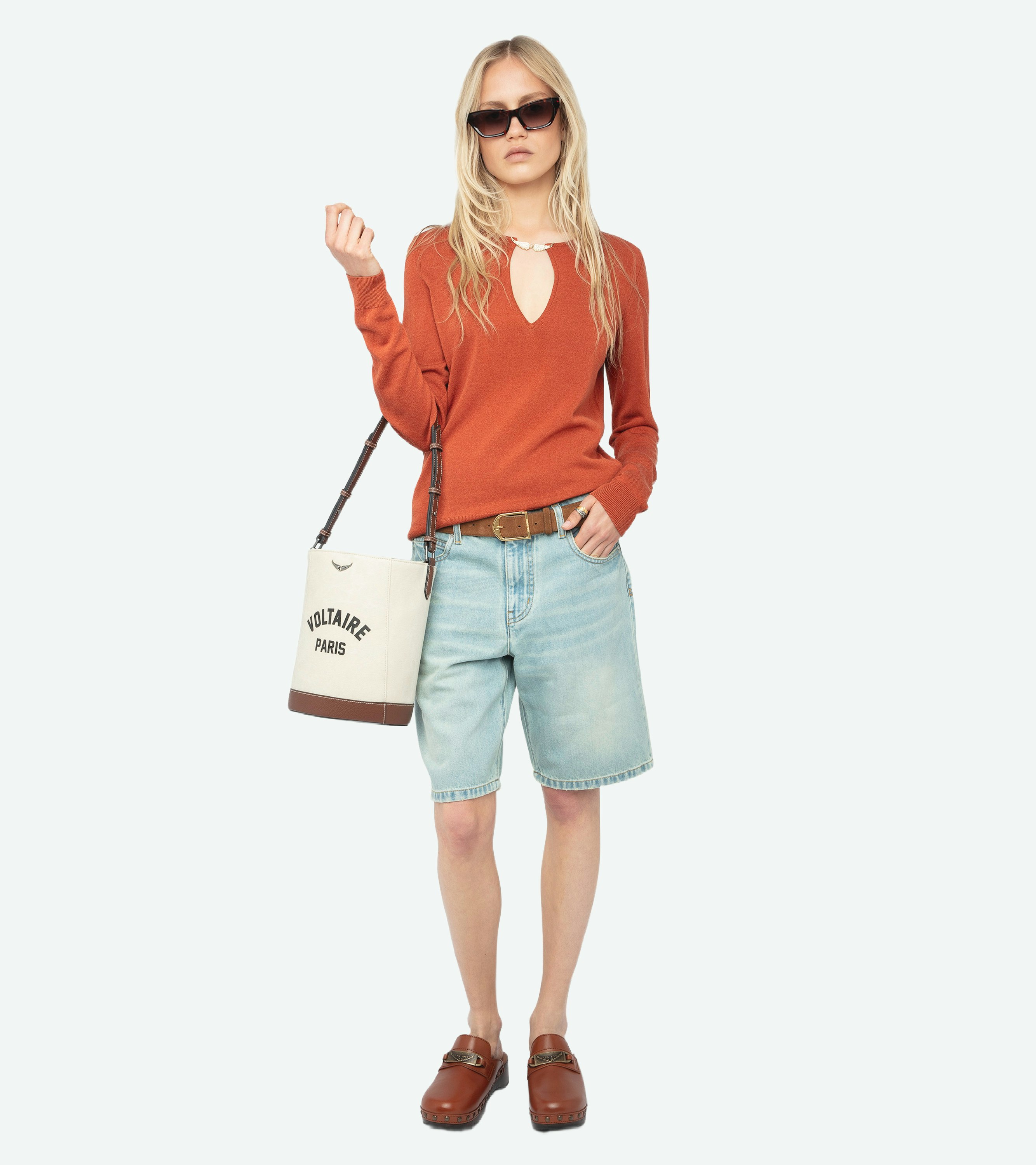 Sayan Sweater - Long-sleeved knit top with wing closure.