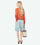 Sayan Sweater - Long-sleeved knit top with wing closure.