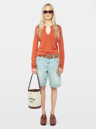 Sayan Sweater - Long-sleeved knit top with wing closure.