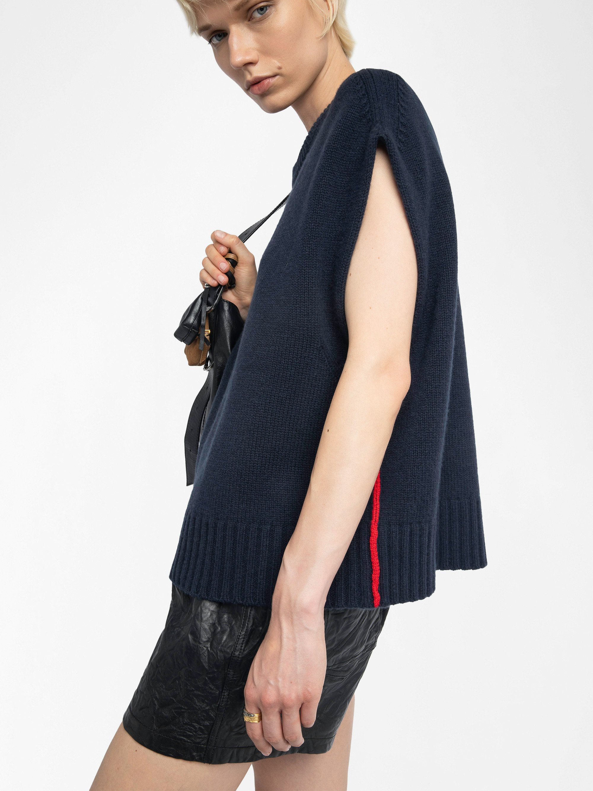Darcy Sweater - Round neck sleeveless sweater with contrasting outside linking on the sides.