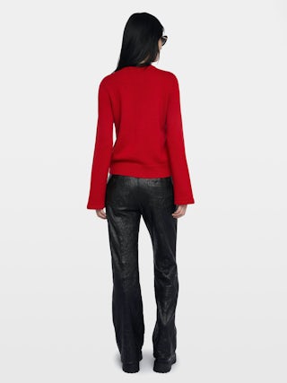 Pull Lucas - Pull ouverture boutonné avec manches évasées.