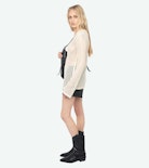 Jumper Rany - Crochet sweater with metallic wing clasp and rhinestones.